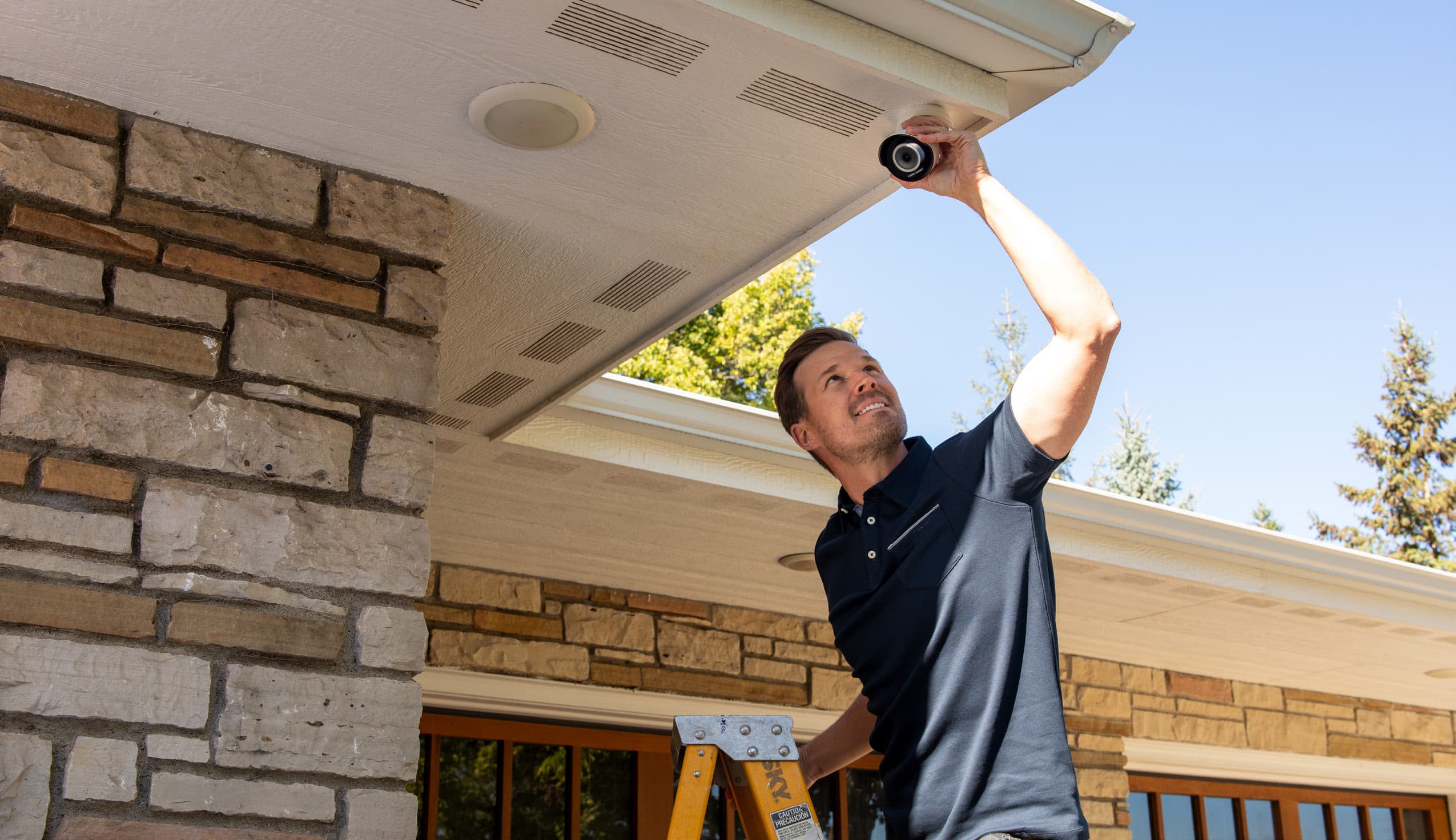 Installer with Outdoor First Alert VX Camera